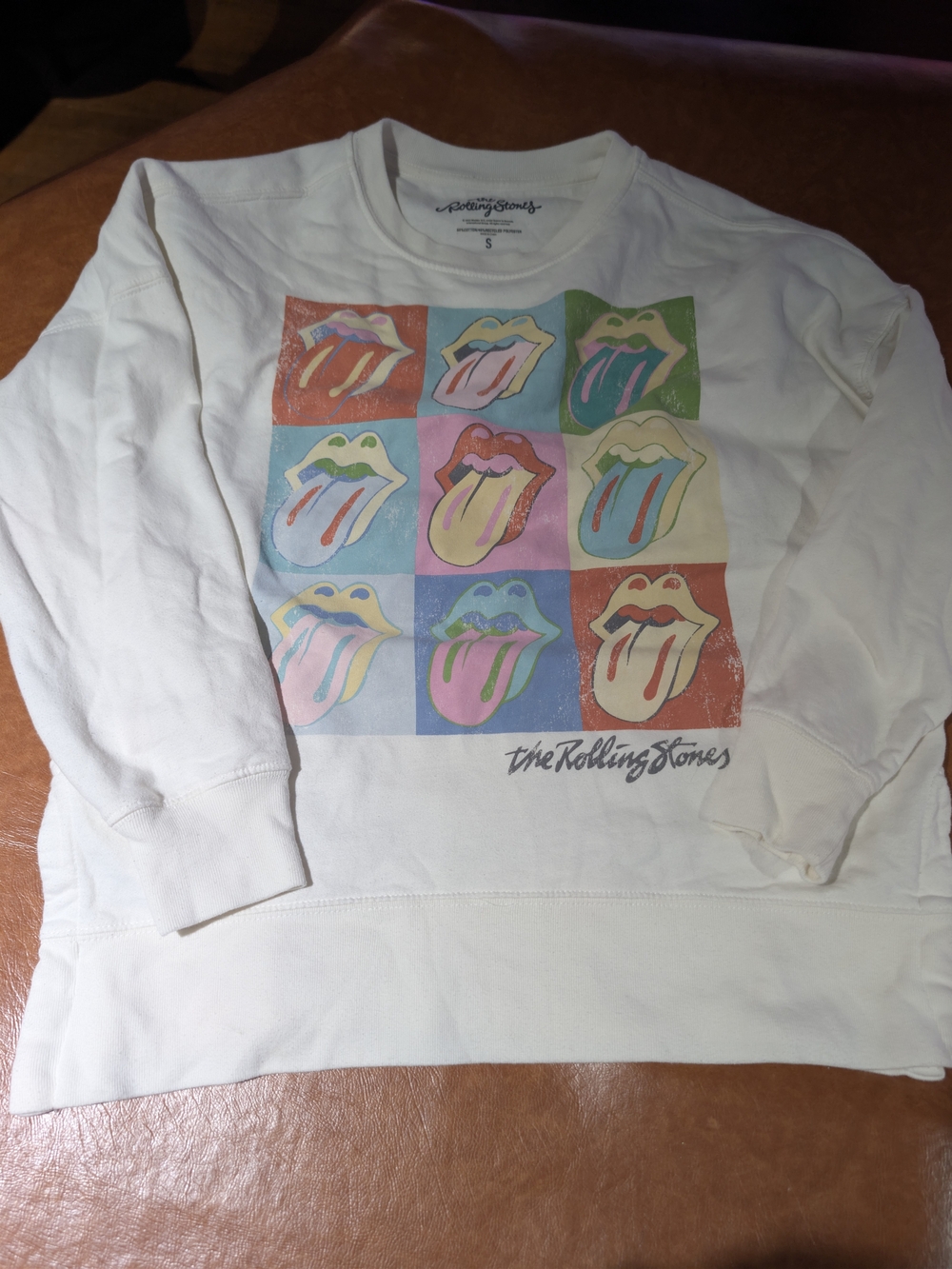 the Rolling Stones White Crewneck Sweatshirt with Multicolor Pop-Tongue Grid